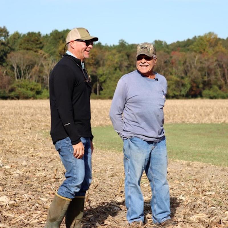 Millsboro farmer Dallas Wright, right, shares a laugh with Jayme Arthurs, USDA NRCS state resource conservationist, at a 2021 soil health training event. FILE PHOTO
